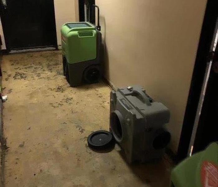 Air movers in office hallway